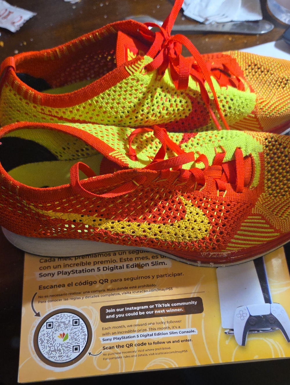 Nike Flyknit Running Shoes in Neon Yellow and Orange